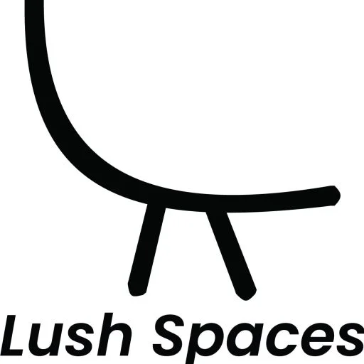 A stark contrast of a white clock on a black background, showcasing the clock's face and hands clearly.