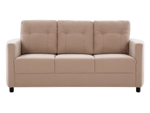 A couch illuminated by a beam of light in a dimly lit room, creating a contrast between light and shadow.