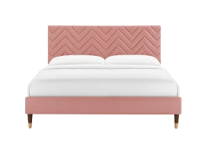 A Leah Velvet Bed featuring a soft pink velvet headboard, adding a touch of elegance to the bedroom decor.