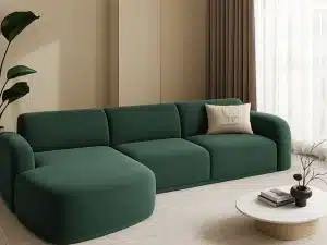 A green sectional sofa in a living room, showcasing a custom sofa bed design available in Dubai.