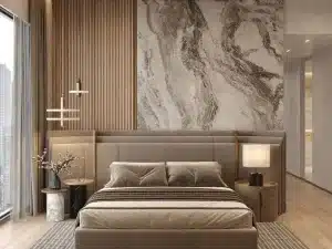 Modern bedroom featuring a marble wall and wood flooring, designed for peaceful and restful nights.