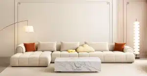 A cozy living room featuring a couch, coffee table, and lamp, illustrating a stylish space for made-to-order furniture in UAE.